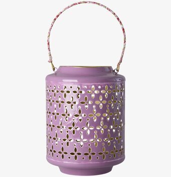 Foto av lila lanterna med perforerat mönster, vit bakgrund