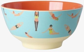 Foto: Turkos skål med retro simmarmönster, orange insida