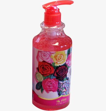 Bild av livlig rosa handtvål med blommig etikett