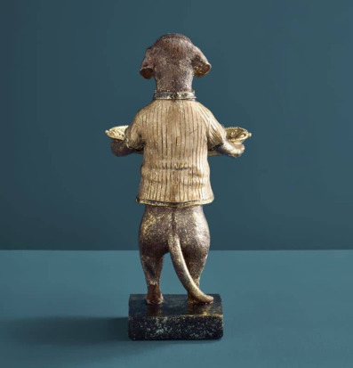 Foto: Hundfigur serveringshållare med två fat bakifrån