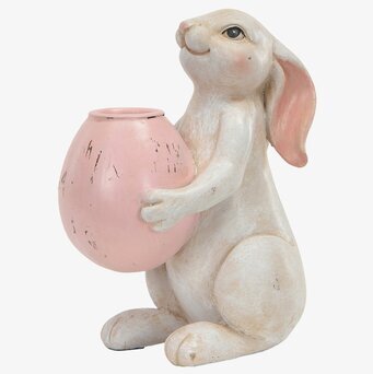 Foto: Ljusstake hare med rosa ljushållare frilagd