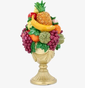 Foto fruktuppsats i skål med ananas, druvor, blad