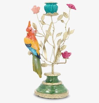 Foto av dekorativ ljusstake med fågel och bladverk