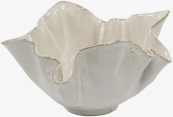 Foto: Vit vågformad dekorationsskål i keramik, frilagd