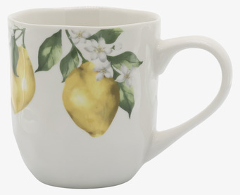 Foto: Vit mugg med citronmotiv och blommor frilagd