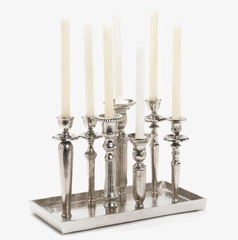 Bild av elegant ljusbricka med sju ljus i metall