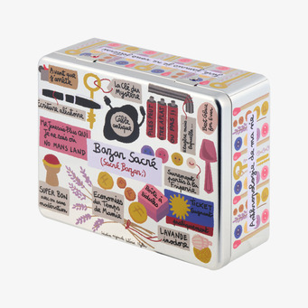 Foto: Plåtburk med lock och grafiskt collage motiv