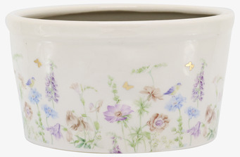 Foto: Krämvit keramikkruka med blommor och fjärilar