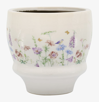 Foto: Krämvit kruka med blommor, fågel, fjärilar