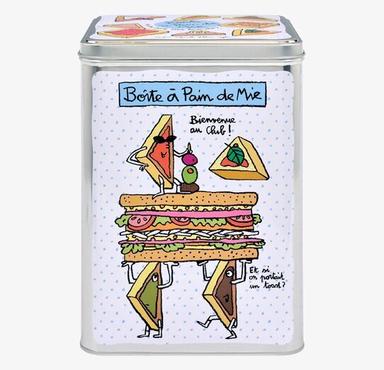 Bild av färgglad plåtburk för kex och bröd i köket