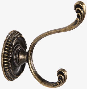 Foto: Dubbel väggkrok i antik mässing på vit bakgrund