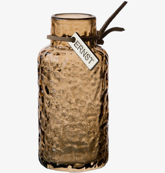 Foto av bärnstensfärgad glasvas med strukturerad yta