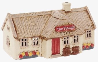 Foto av keramikljuslykta pubhus i miniatyr vit bakgrund