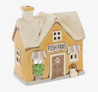 Foto av keramik ljuslykta hus med butiksmotiv 2026