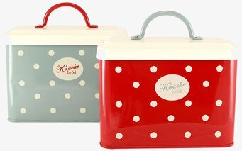 Bild på två retro plåtburkar för knäckebrödsförvaring