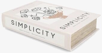 Bild på bokformad förvaringslåda i benvitt, text