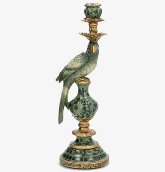 Foto: Grön papegojljusstake med gulddetaljer vit bakgrund