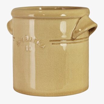 Foto av gult rak krus i stengods med pip och krackelering