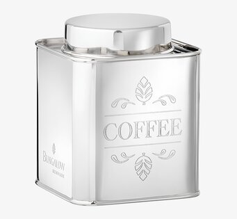 Foto på metallisk kaffeburk med präglad COFFEE-text