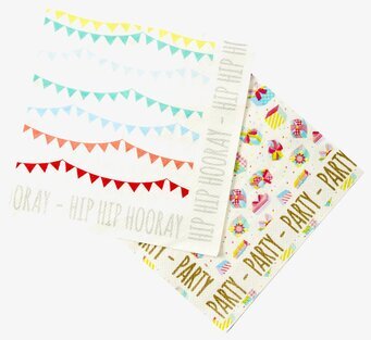 Bild av festliga servetter med livliga mönster och färger