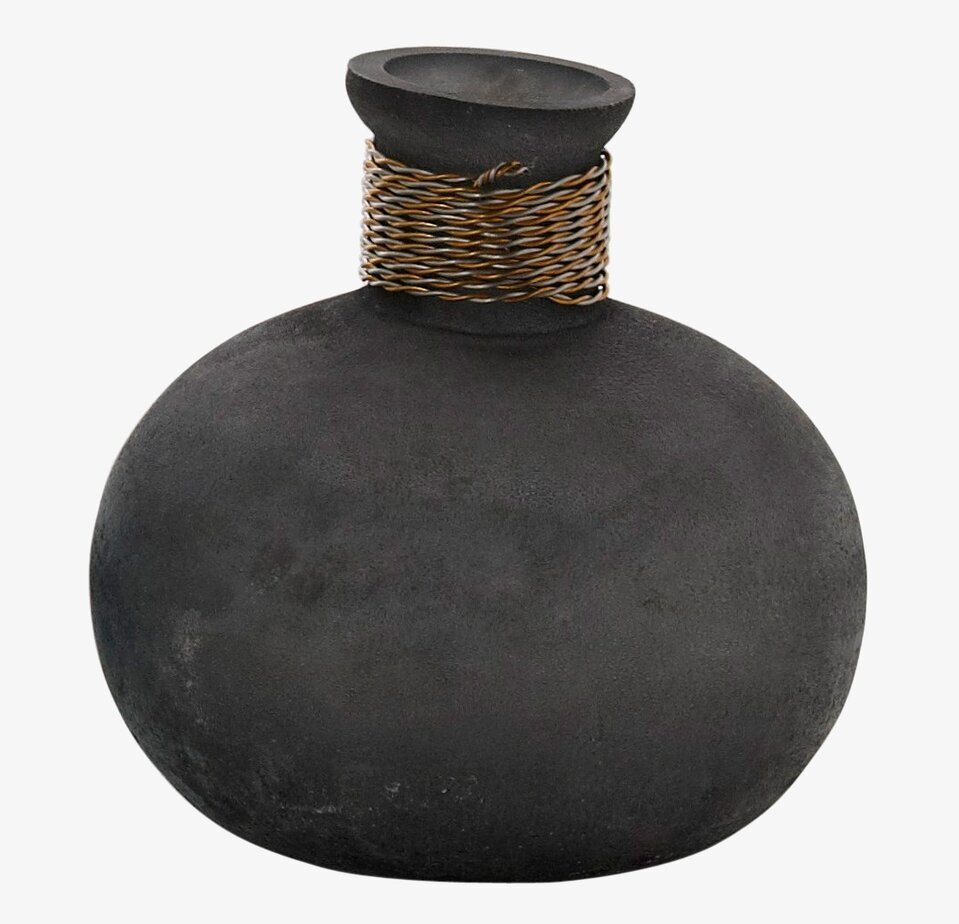 Foto av elegant rund vas med spiraldesign i metall