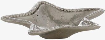 Bild av ett fat med sjöstjärneform och metallisk yta