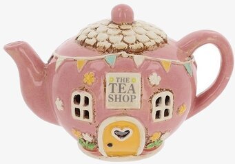 Foto: Ljuslykta tekanna med Tea Shop-hus i keramik