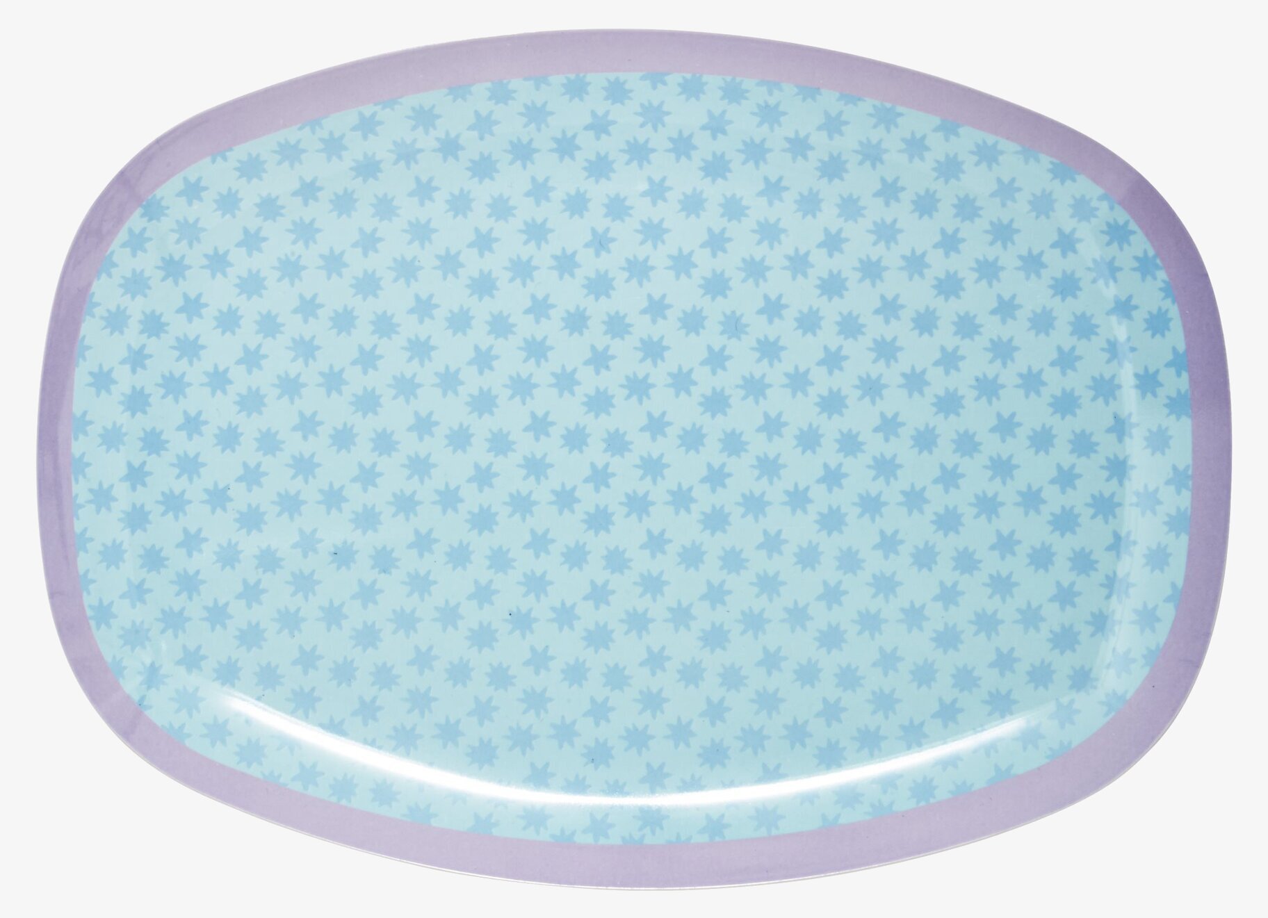 Bild av oval tallrik med stjärnmönster och lila kant