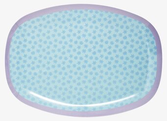 Bild av oval tallrik med stjärnmönster och lila kant