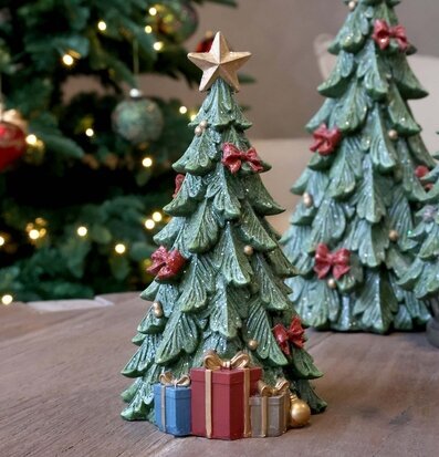Foto: Minigran med paket, rosetter och glitter julbord
