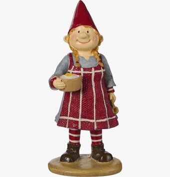Foto av tomteflicka med grötskål på vit bakgrund