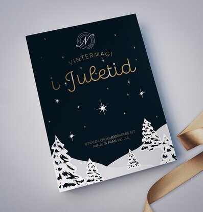 Foto: Adventskalender med vintermotiv och guldband