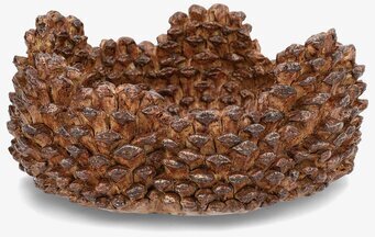 Foto: Naturinspirerad brun skål med kottefjällstruktur