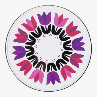 Foto av rund plåtburk med tulpanmotiv i färgglada nyanser