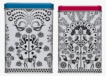 Bild av stilrena plåtburkar med djur- och naturmotiv