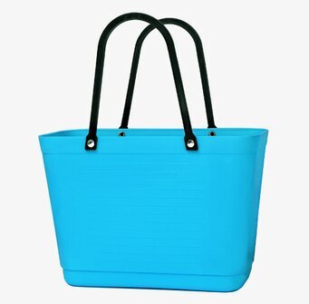 Bild av turkos väska med svarta handtag och stilren design