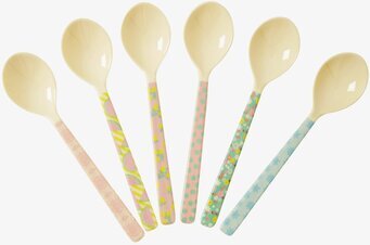 Bild av färgglada skedar med lekfull och livfull design