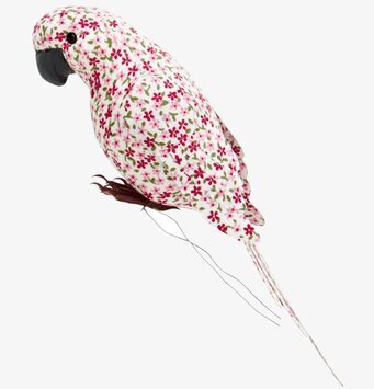 Bild av färgglad textilfigur med blommigt mönster