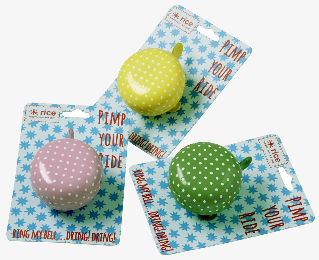 Bild av tre färgglada cykelklockor med prickigt mönster