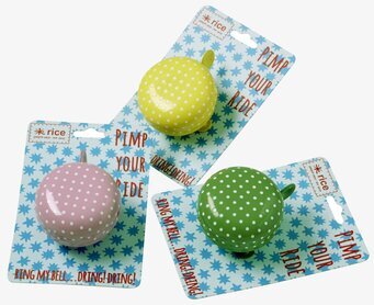 Bild av tre färgglada cykelklockor med prickigt mönster