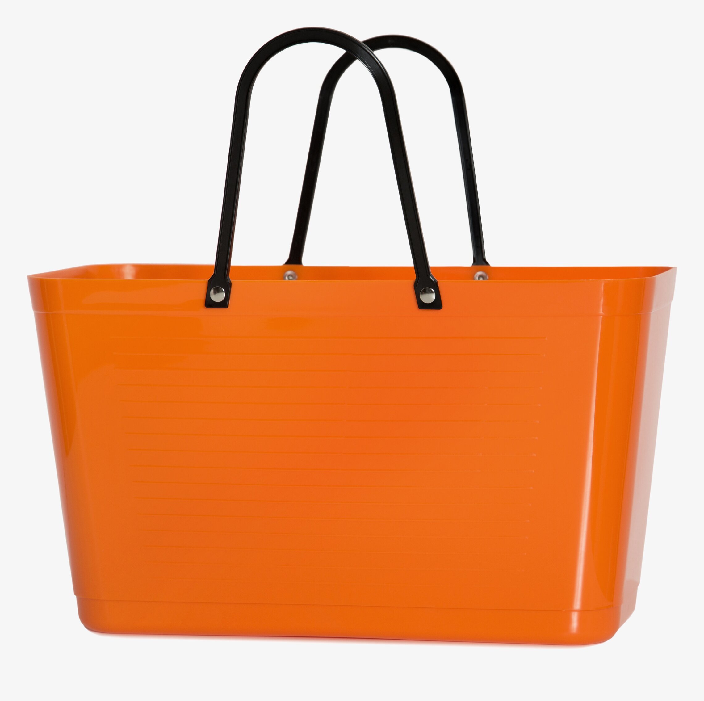 Bild av orange väska med stilren och funktionell design