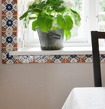 Bild av hemtrevligt kök med stil och funktionalitet