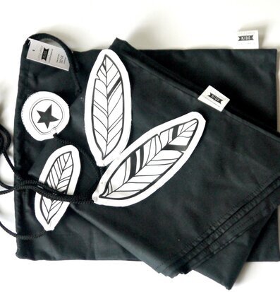 Bild av svarta textilier och detaljer för tipitält