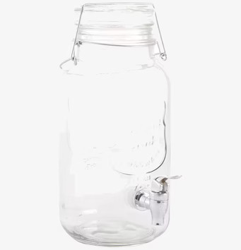 Bild av glasburk med kran och handtag för servering