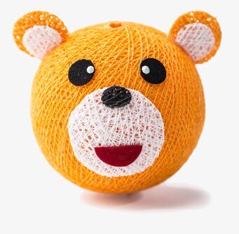 Bild av lekfull björnboll i orange med unik design