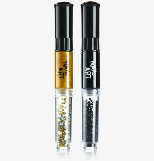 Bild av nagelkonsttuber med guld- och svartdekorationer