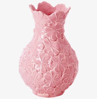Bild av rosa vas med blommönster och vågig kant