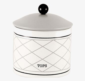 Bild av stilren plåtburk med tidlös design för hemmet