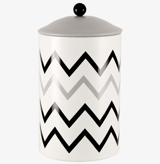 Bild av modern plåtburk med zigzag-mönster och knopp