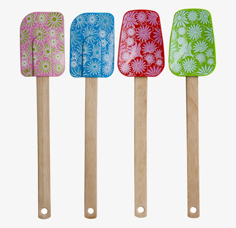 Bild av fyra färgglada slickepottar med blommönster